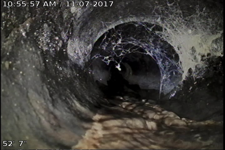 Interior of a pipe being inspected by a SeeSnake camera and displayed on a SeeSnake monitor | SeeScan SeeSnake pipe inspection footage